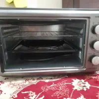 توستر در حدنو...فقط درش شکسته