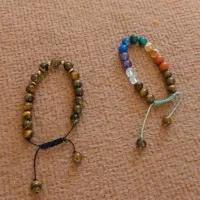 گردنبند و دستبند هفت چاکراه و چشم ببر