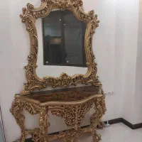 اینه و کنسول دو عدد اینه تک و میز پیشخوان کشور دار