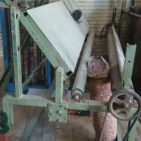 دستگاه رول کن پارچه بافندگی