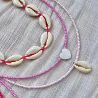 انواع گردنبندمونجوقی صدفی در طرح های مختلف