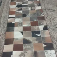 فرش دستباف چرم تکه دوزی پوست گاو