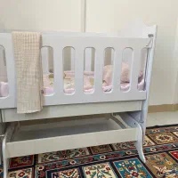 تخت گهواره ای نوزاد