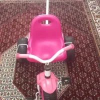 سه چرخه صورتی رنگ|دوچرخه، اسکیت، اسکوتر|میانه, |دیوار