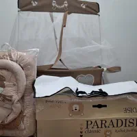 گهواره نوزاد.به علاوه تشک