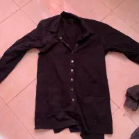 تعدادی مانتو|لباس|شیراز, مبعث|دیوار