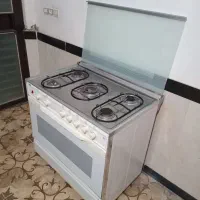 اجاق گاز فردار سفید رنگ سینجر تمیرز ۲ موتوره|اجاق گاز و لوازم برقی پخت‌وپز|مهاباد (آذربایجان غربی), |دیوار