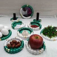 هفت‌سین و مجسمه سنگی