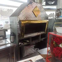 به یک نفر همکار کباب پز ذغالی