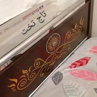 تخت یک نفره همراه با کشو زیر تخت