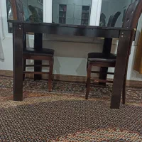 میزناهارخوری سه عددصندلی ویک عددساعت ایستاده سالم