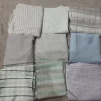 تعدادی پارچه مردانه و زنانه