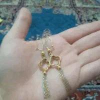 گوشواره ۱5۰ بالای تابلو