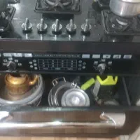 اجاق گاز طرح فر صفحه شیشه ای ۵ شعله