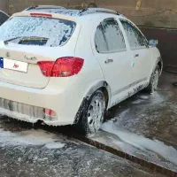 کوییک r1402 سفید مشکی(فروش و یا معاوضه فوری)