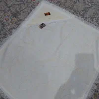 پتو و لباس نوزادی