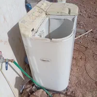 دوتا ماشین لباسشویی دو قلو