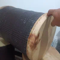 طبل دمام آکبند|درام و پرکاشن|قم, پردیسان|دیوار