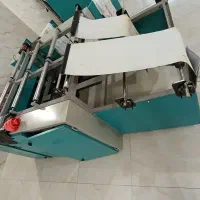 دستگاه رول کن سفره و پر کن دستمال کاغذی