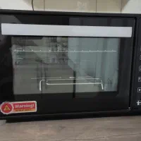 فرو اون توستر داتیس