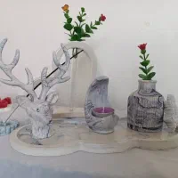 دکوری سنگ مصنوعی گل روبانی،شمع