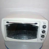 توستر در حد نو با میز