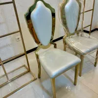 صندلی سلطنتی چرم و استیل طلایی