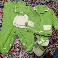 لباس نو نوزاد تمیز زیبایی در ملک اباد