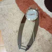 ساعت دیواری آونگ دار