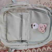 کوله پشتی بزرگسال رنگ سبز کم رنگ پاستیلی