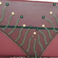 مهره دوزی چارقد و لباس محلی