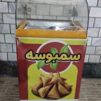 اجاق گاز.گرم کن سمبوسه.عروسک بادی