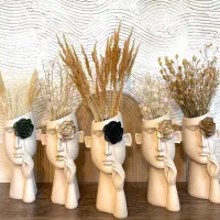 دکوری و گلدان گل چشم