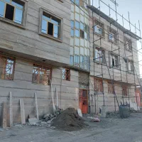 اجرای نمای ساختمان سنگ سرامیک آجرنما