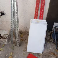 قفسه 4طبقه دیواری و پایه رگال لباس