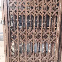 انواع درب آکاردئونی چوبی آهنی دوجداره