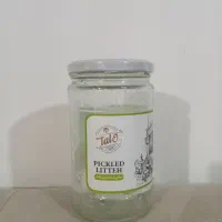 تعدادی شیشه نوشابه و شیشه سس و ترشی