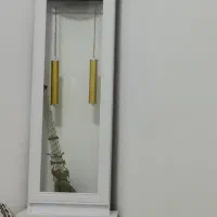 ساعت آیینه پرده