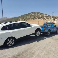 امداد خودرونیسان یدک کش خودروبر جرثقیل چرخ گیر