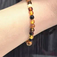 دست بند زنانه کهربا عقیق یاقوت زمرد زبرجد