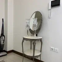 اینه و شمعدان برنجی