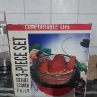 یک عددخوردکن دستی وقابلمه