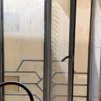 در فلزی  و پنجره