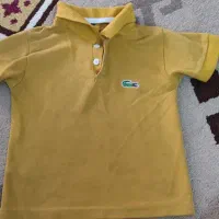 چند عدد لباس بچه و اسباب بازی