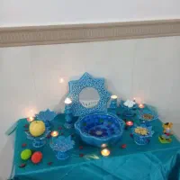 هفت‌سین‌سفالی‌همراه‌با‌آینه‌جا‌شمعی