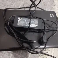 یه عدد دستگاه وای فای وتلفن خونه ولب تاپ