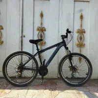 دوچرخه سایز 26 دنده ای در ح نو ترمز دیسکی