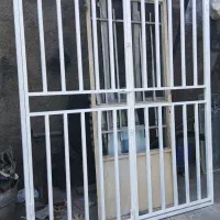 امین حفاظ سازنده دربهای اکاردئونی ونرده وحفاظ