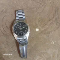 ساعت مچی و کفش‌های عمو برقی