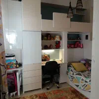 تخت دو طبقه مجهز کمد لباس و کتابخانه